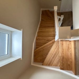 Double winder Oak Staircase claddding in Alwoodley, Leeds13